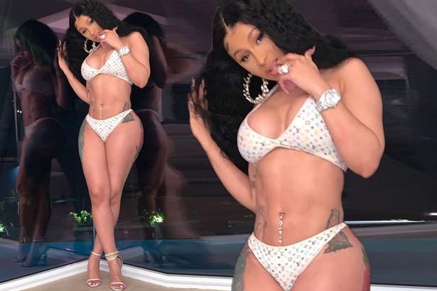 Cardi B stuns fans as she strips down to her G-string and shows
