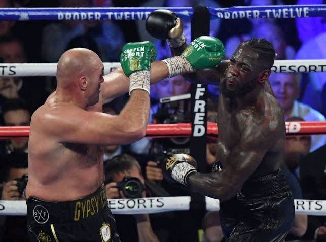 Why Has The Third Fight For Tyson Fury & Deontay Wilder Been Postponed? 
