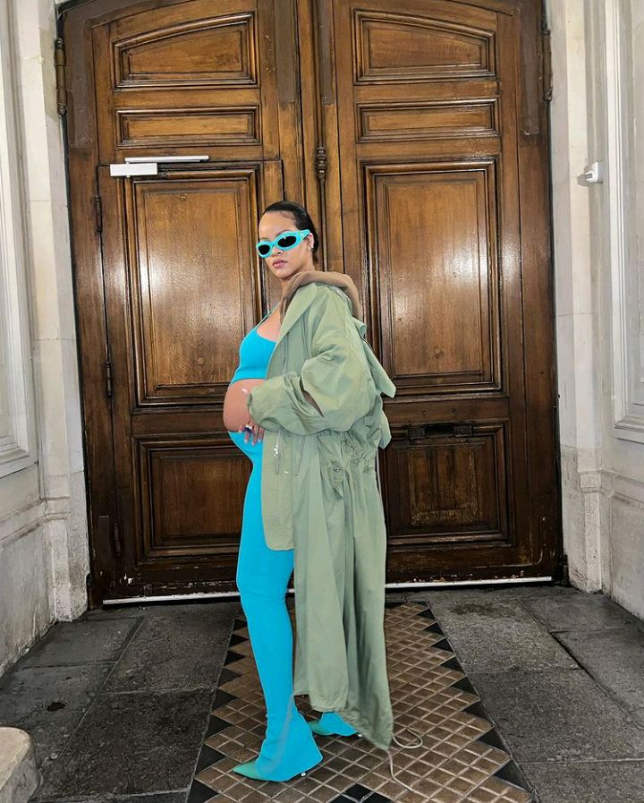 Pregnant Rihanna Shows Off Baby Bump in Skintight Aqua Jumpsuit at Paris Fashion Week: 'Thicc'