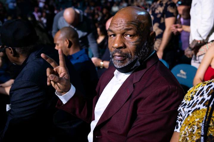 Man challenges Mike Tyson to fight at bar and PULLS GUN OUT.