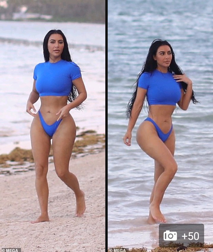 Kim rocks in a bright blue crop top-style top with high-waisted tiny bikini  bottoms