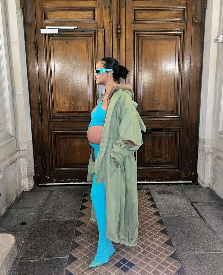 Pregnant Rihanna Shows Off Baby Bump in Skintight Aqua Jumpsuit at Paris Fashion Week: 'Thicc'