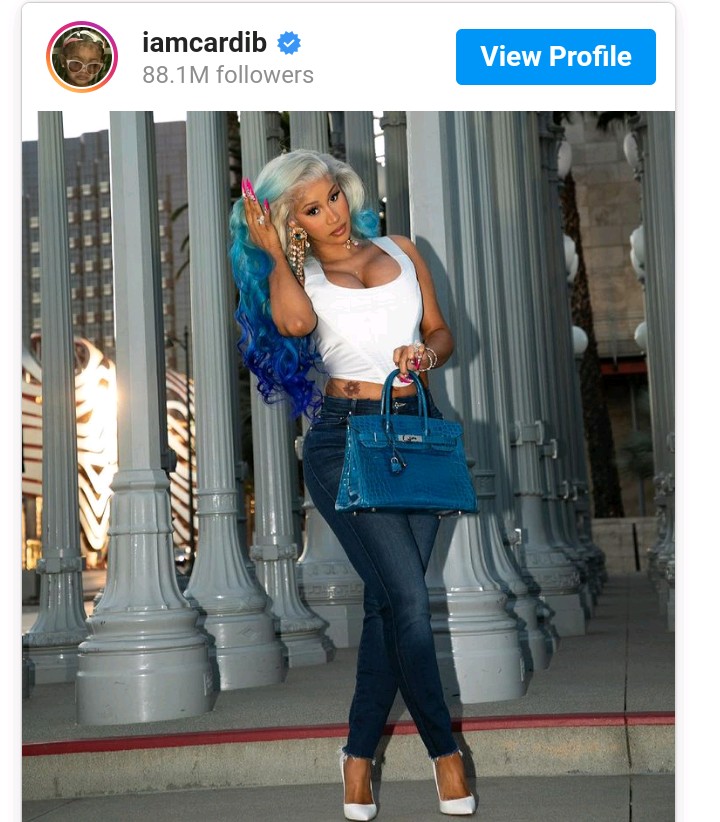 Cardi B matches her hair to her $79K blue Hermès Birkin bag