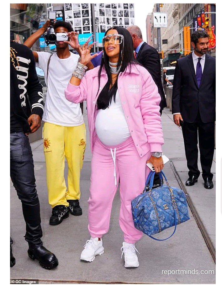 Pregnant Rapper Cardi B rocked pink sweatshirt while walking along with her husband Offset 