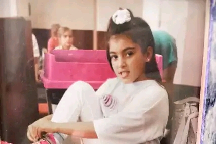 Kim Kardashian Poses in Scrunchie and Pink Ice Skates in Childhood Photo: 'I Still Make This Face'