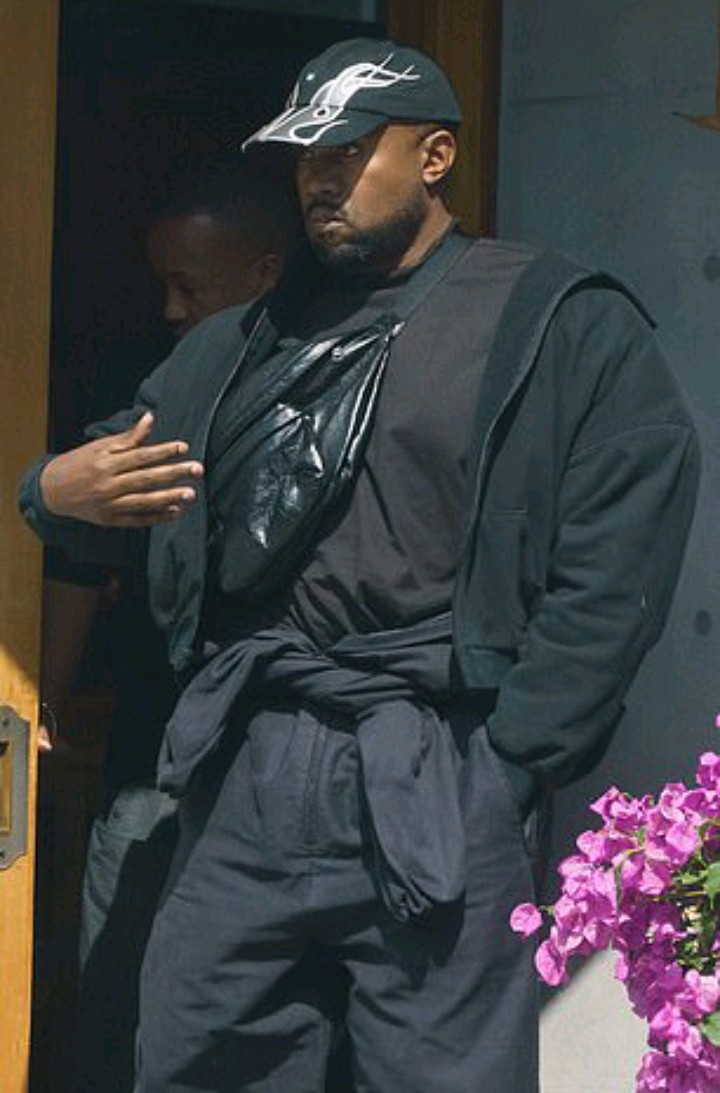 Kanye West emerges leaving sushi restaurant as he continues month-long sabbatical in Japan
