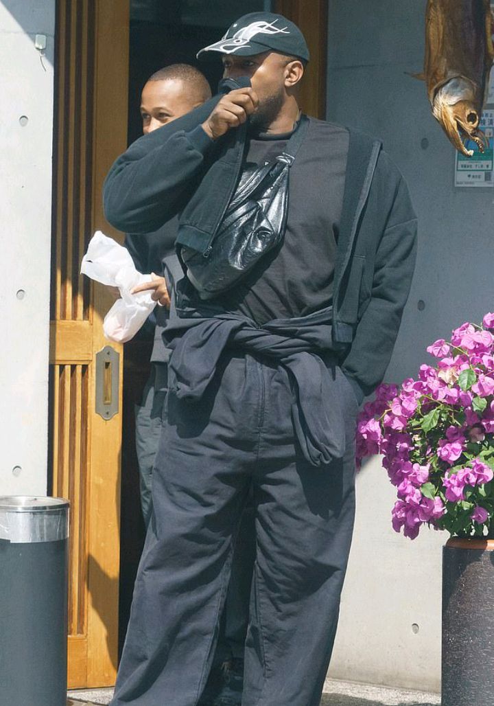 Kanye West emerges leaving sushi restaurant as he continues month