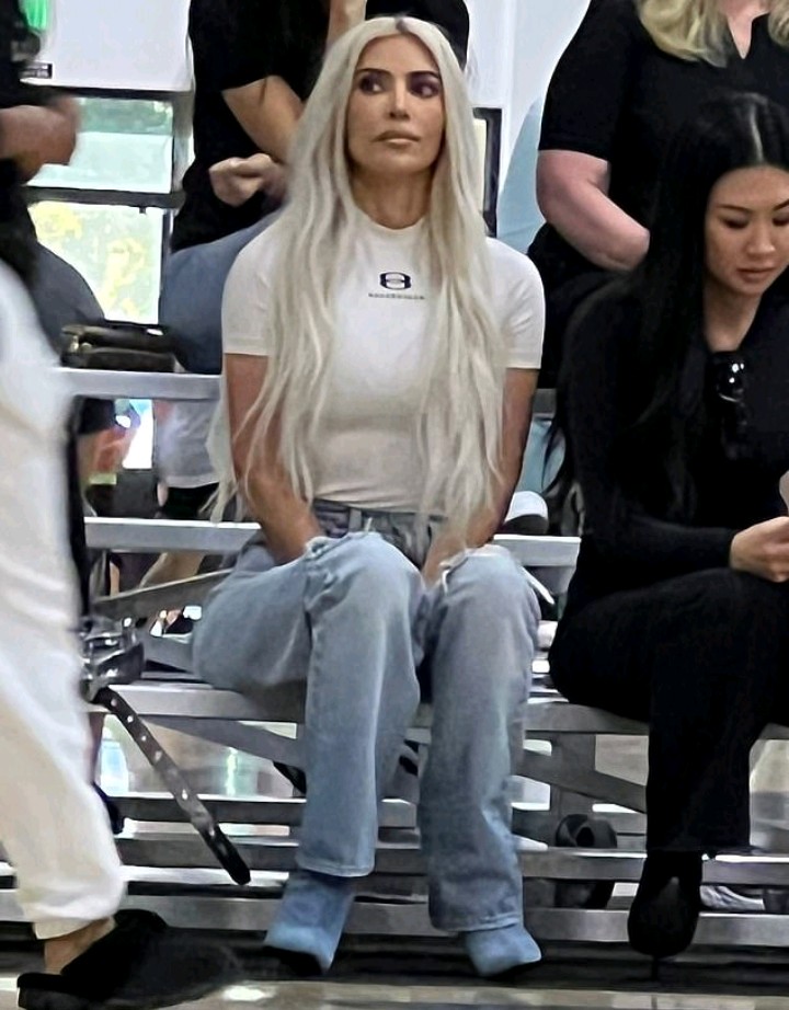 Kim Kardashian looks tense as she reunites with ex Kanye West at daughter North's basketball game