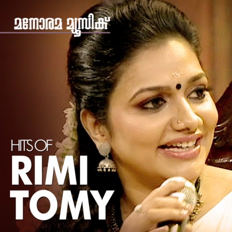 Midumidukkan (From "Rajadhi Raja") ft. Rimi Tomy, Kumari Nandha J. Devan & Yasin | Boomplay Music