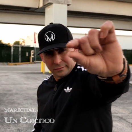 Un Cortico | Boomplay Music