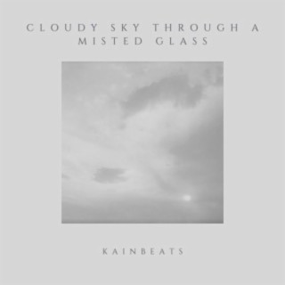 cloudy sky through a misted glass