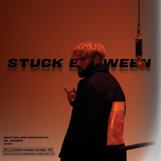 Stuck Between lyrics | Boomplay Music