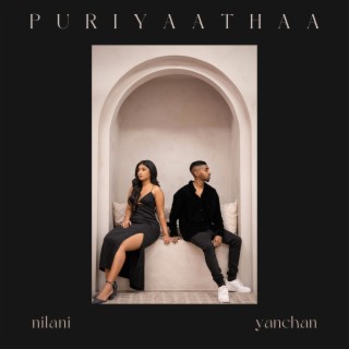 Puriyaathaa ft. Yanchan Produced lyrics | Boomplay Music