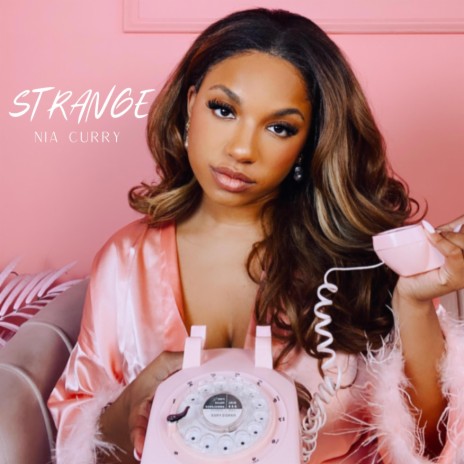 Strange | Boomplay Music