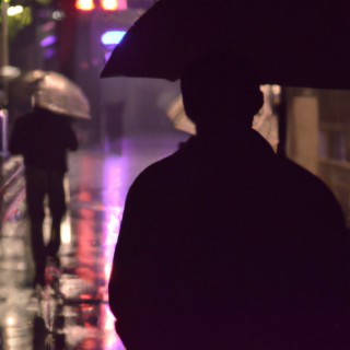 Walking in Heavy Rain at Night