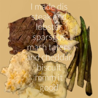 I made dis steak and lobster sparsgus mash taters and cheddar biscuit mmm it good