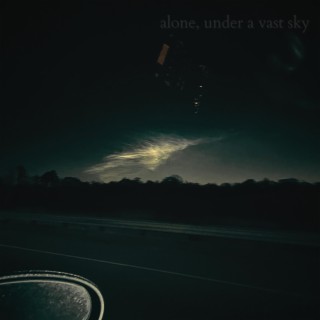 alone, under a vast sky