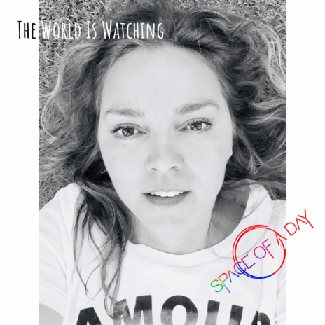 The World Is Watching | Boomplay Music