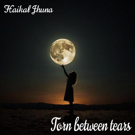 Torn between tears | Boomplay Music