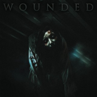 Wounded ft. Travis Worland & Enterprise Earth lyrics | Boomplay Music