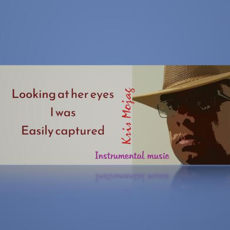 Looking at her eyes I was Easily captured | Boomplay Music