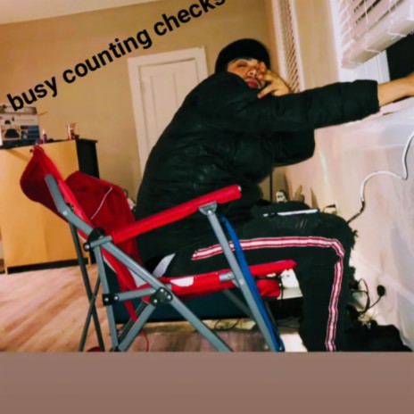 Busy counting checks | Boomplay Music