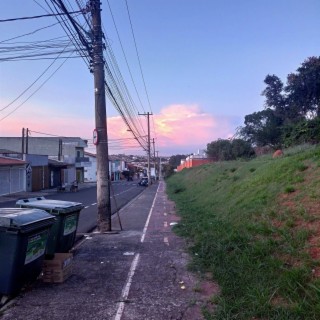 Walking Down The Street At Sunset