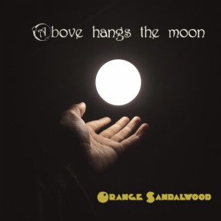 Above hangs the Moon
