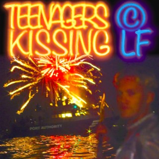 Teenagers Kissing
