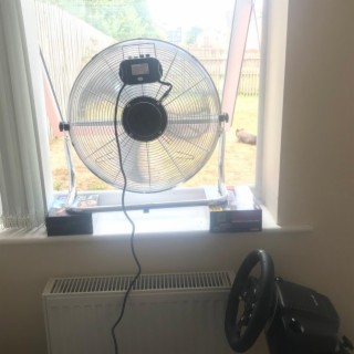 Fan In The Window