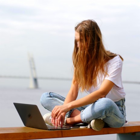 Study and Work with a Laptop Near the Ocean