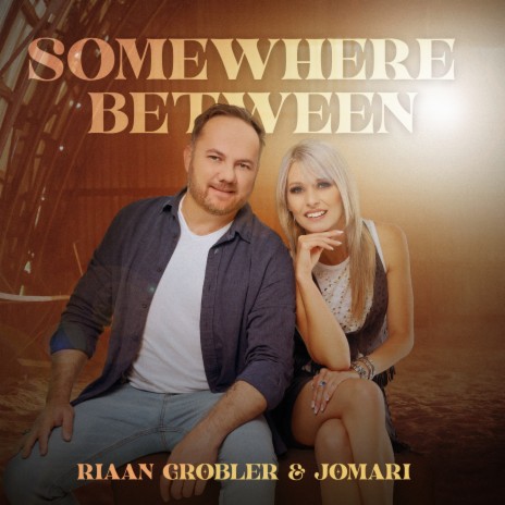 Somewhere Between ft. Jomari | Boomplay Music