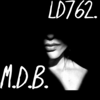 M.D.B.