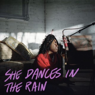 She Dances In The Rain ft. Janae Nicole lyrics | Boomplay Music