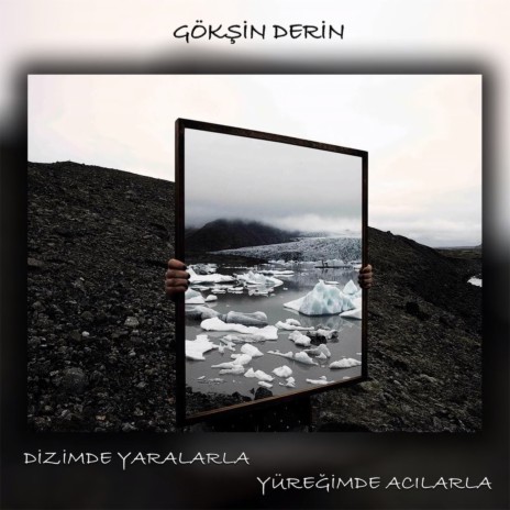 Dizimde Yaralarla Yüreğimde Acılarla | Boomplay Music