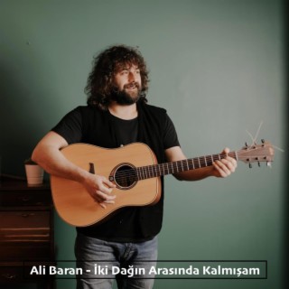 İki Dağın Arasında Kalmışam