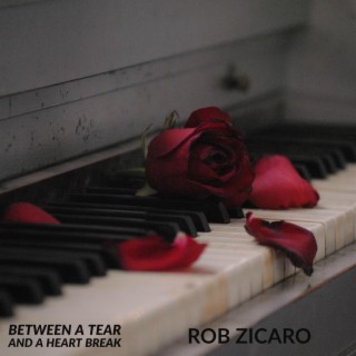 Between a Tear and a Heartbreak lyrics | Boomplay Music