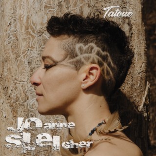 Tatoué