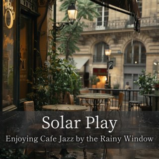 Enjoying Cafe Jazz by the Rainy Window