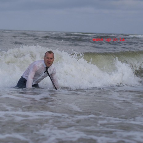 Malibu Wetsuit in the Surf for a Father and a Boy