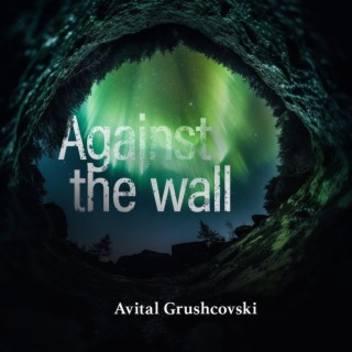 Against the wall