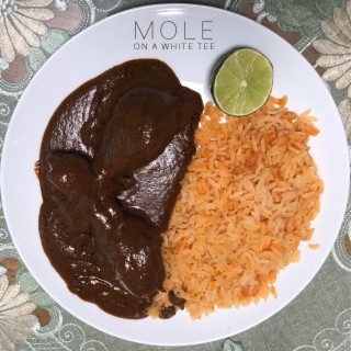 MOLE ON A WHITE TEE