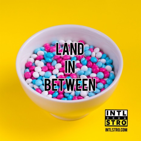 Land In Between | Boomplay Music