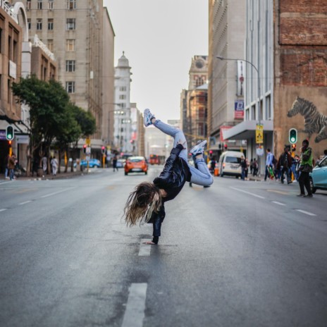 Dancing in the city traffic. | Boomplay Music