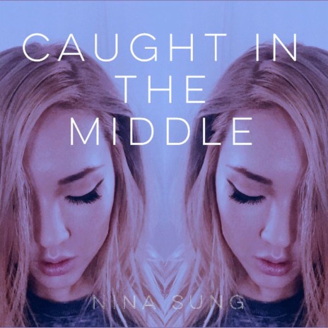 Caught in the Middle | Boomplay Music