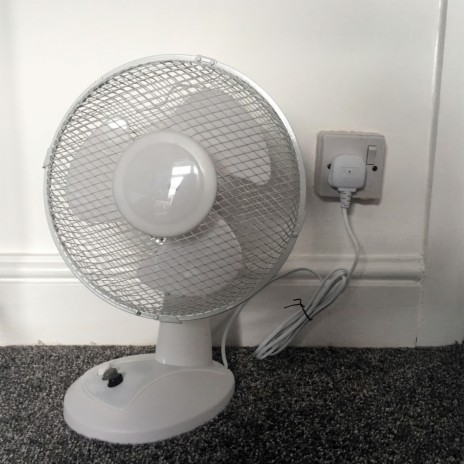 Stationary Desk Fan with Plastic Bag Attachment