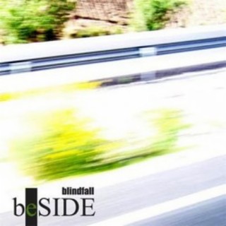 beside