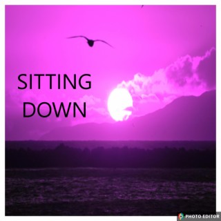 SITTING DOWN