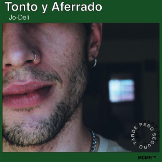 Tonto y Aferrado lyrics | Boomplay Music