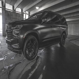 Blacked out suburban